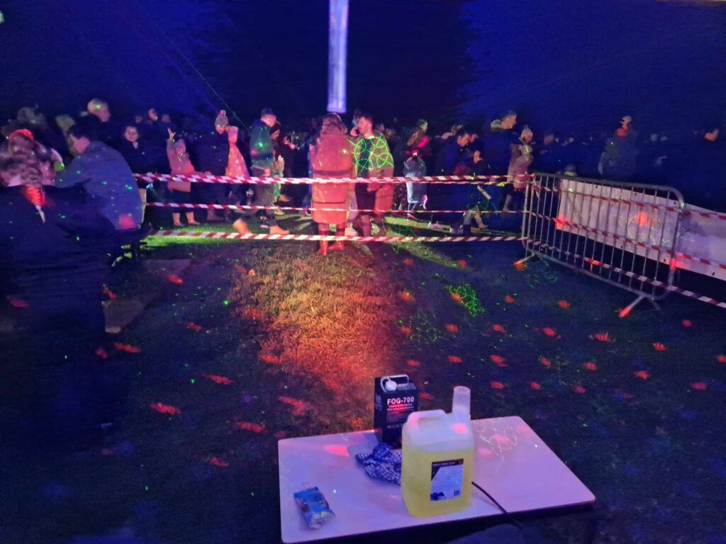 People dancing at RockinDaddysRadio.com at the Martock Fire Work Event in November 2023